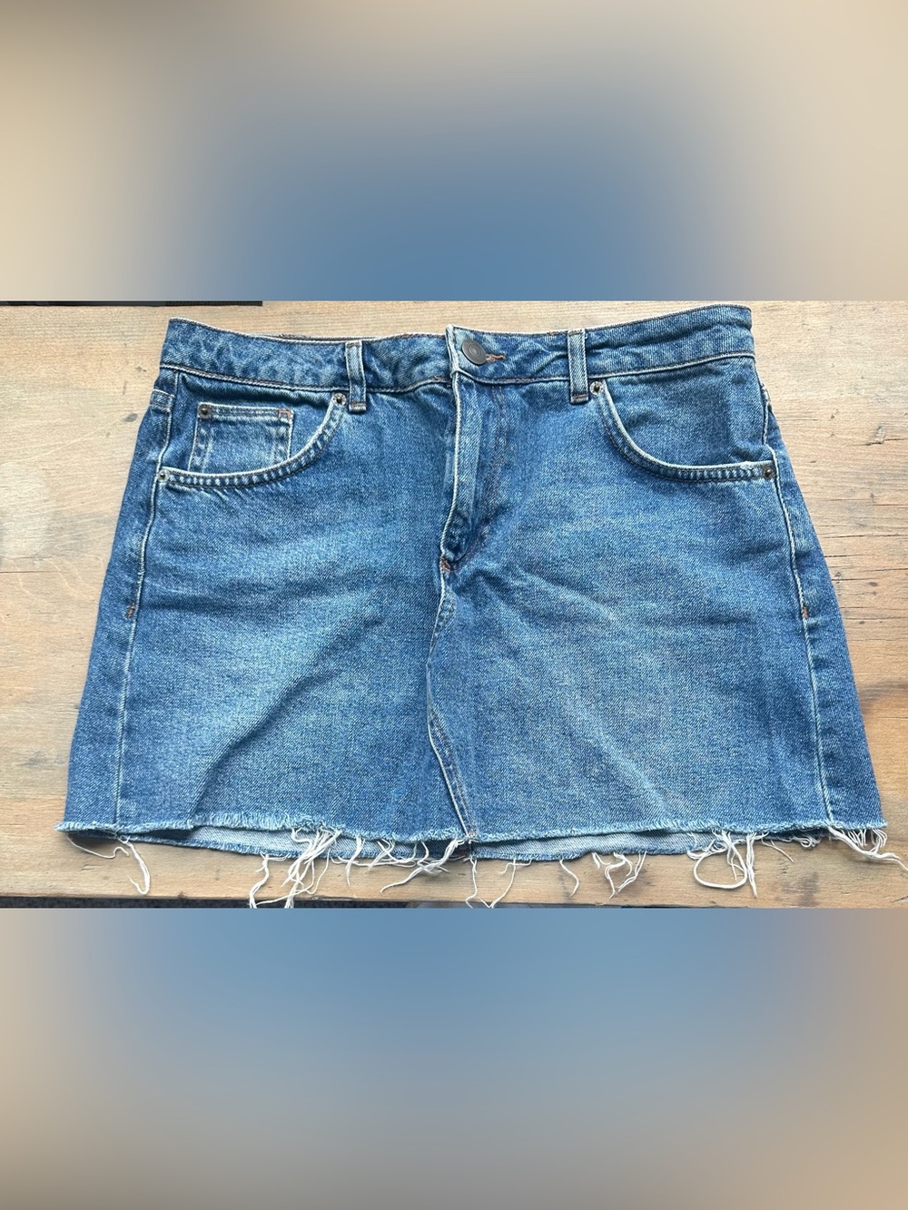 BDG Light Blue Denim Mini Skirt with Frayed Hem